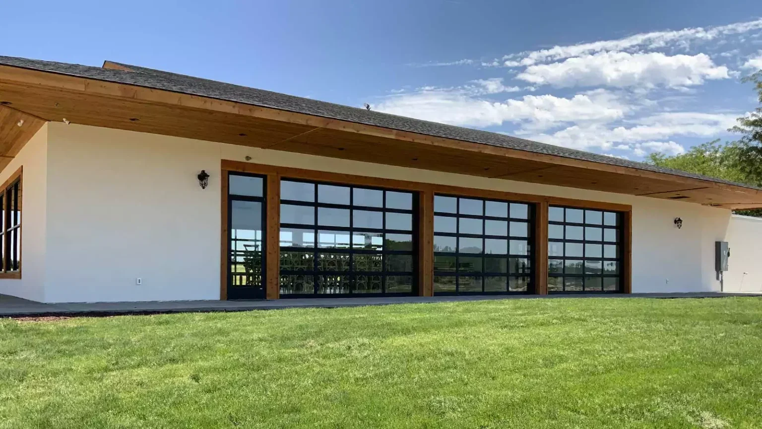Full-view aluminum glass garage doors installed by Overhead Door Company